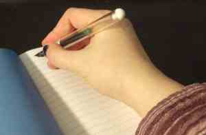 Pen in my hand with the cap off.