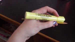 My hand holding a highliter for scale of me.