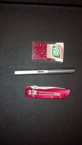 folding knife and tic tacs for scale. No idea why I picked these items.
