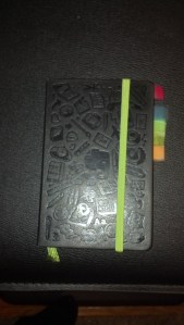 My Evernote Notebook before I put the sticker on the cover. I use pocket notebooks, I use Evernote, it seemed worth trying. I liked the Premium Evernote it came with, was not overly thrilled with the notebook itself. I'm not a fan of the embossed cover in general. You can also see my project flag markers.