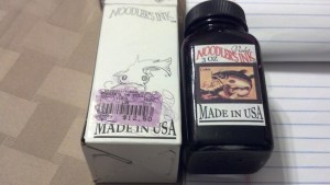 Noodler's Violet next to box.