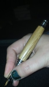 pen in the hand without cap